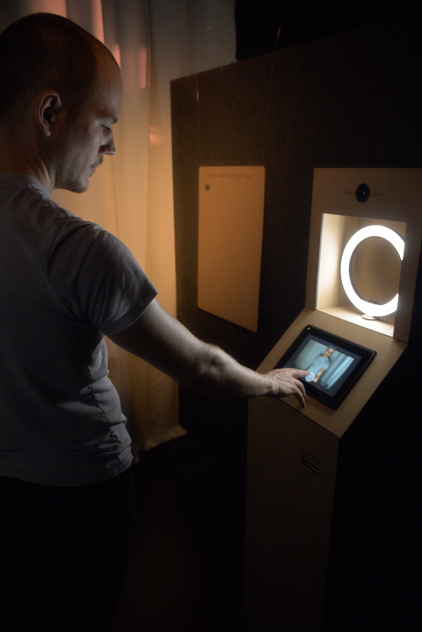 A visitor interacting with the installation